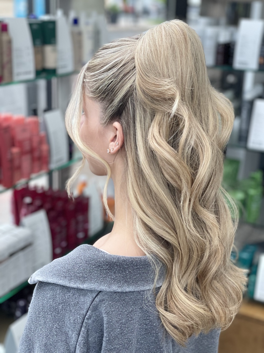 Half-up style with soft blonde waves